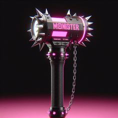 a flashlight with spikes and chains attached to it's body on a pink surface