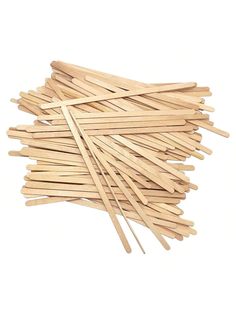 small wooden sticks on white background with clippings for toothbrushes or other dental care products