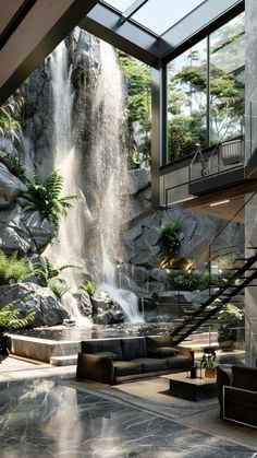 a living room filled with furniture and a waterfall