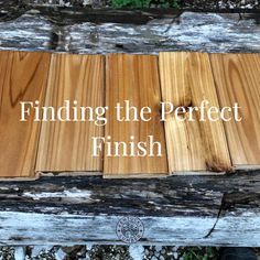 the words finding the perfect finish on wood planks