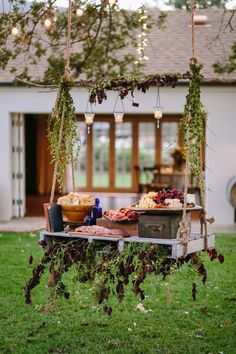 a table with food on it in the grass