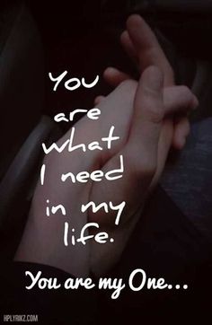 someone holding the hand of another person in their lap with text that reads, you are what i need in my life