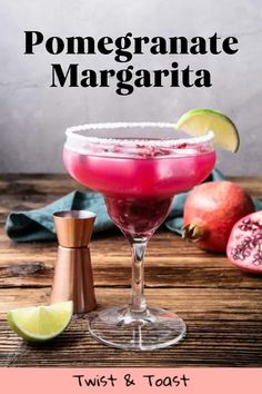 pomegranate margarita in a coupe glass garnished with salt and lime