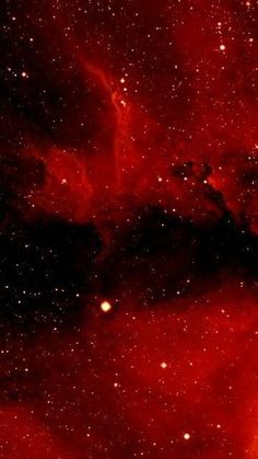 an image of some red stars in the sky