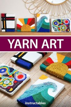 yarn art is displayed on the table with other items