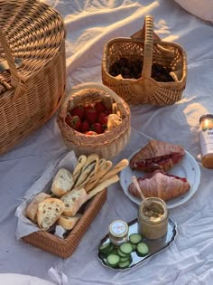 a table topped with baskets filled with food