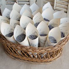 a basket filled with lots of paper cups