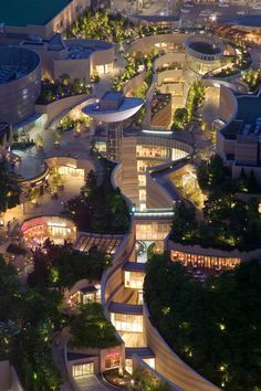 an aerial view of a circular building at night