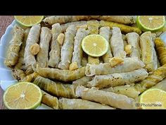 there are many different types of food on the plate and in the middle one is lemons