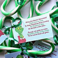 some green and white paper streamers with an elf on them