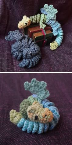 crocheted toys are sitting on a purple blanket and one is holding a box