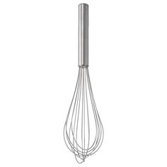 a large metal whisk on a white background with clippings to the side