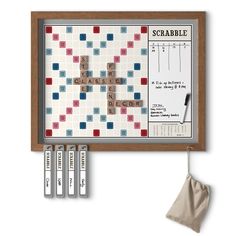 a scrabble board and four pieces of cloth