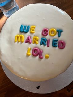 a cake with the words we got married lol written in frosting on it