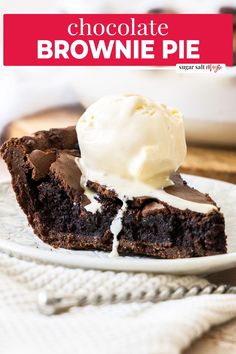 a piece of chocolate brownie pie with ice cream on top is sitting on a white plate