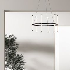 a modern chandelier hangs from the ceiling