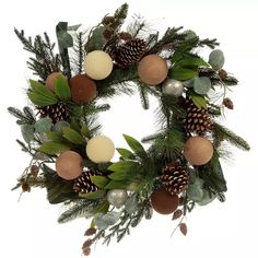 a christmas wreath with pine cones and greenery