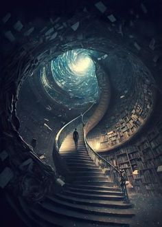 a spiral staircase leading up to a man standing on top of it in front of bookshelves