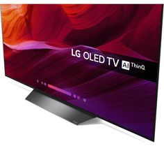 the lg oleed tv is on display in front of an orange and purple background