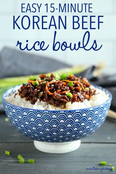 a bowl filled with rice and beef on top of a table