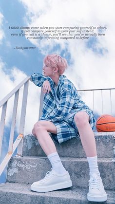 a person sitting on some steps with a basketball in the air and clouds behind them