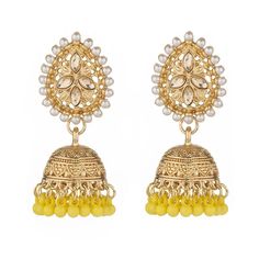 The versatile Cassie Jhumka Earrings are the ideal addition to any collection. Featuring just the right size and delicate details, these earrings can be dressed up or down to suit your style. Embrace their versatility and elevate any outfit with this must-have accessory. *This Product takes a Minimum of 30days to Ship* Navratri Latkans Jhumka Drop Earrings, Navratri Jhumkas With Latkans, Diwali Drop Earrings Danglers, Chandbali Earrings With Latkans, Navratri Earrings For Pierced Ears, Navratri Drop Danglers, Festive Drop Earrings Danglers, Elegant Yellow Earrings For Festivals, Navratri Dangle Jhumkas