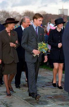 the prince and princess of monaco walk with their families