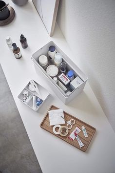 an assortment of crafting supplies sitting on a table