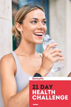 a woman drinking water from a bottle while holding a sign that says 21 day health challenge