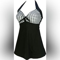 One Piece Swimsuit With Tie Traps, Black Bottom And Polka-Doy Black And White Top New With Tags. Chic Black Lined Tankini, Elegant Black Lined Tankini, Fitted Black Lined Tankini, Black Lined Tankini For Party, Elegant Black Swim Dress With Built-in Bra, V-neck Black Swim Dress For The Beach, Black Printed One-piece Beachwear, Moisture-wicking Black Swimwear For The Beach, Cheap Polka-dotted Swimwear For Vacation