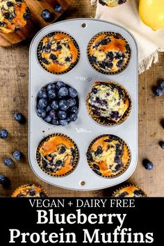 Six protein blueberry muffins in a silver muffin tray on a wood table are surrounded by more muffins, fresh blueberries, and lemons. Text on the image reads, "vegan and dairy free blueberry protein muffins". Protein Blueberry Muffins, Easy Vegan Protein, Protein Blueberry, Peanut Butter Shake, Vegan Blueberry Muffins, Alpha Gal