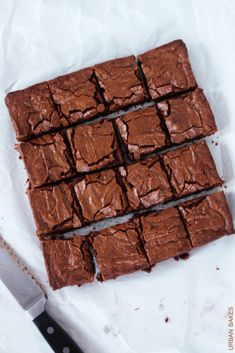 chocolate brownies cut into squares with a knife