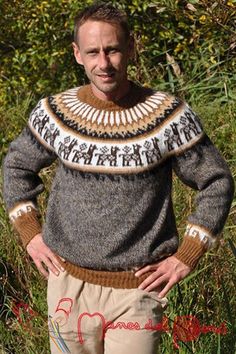 a man standing in the grass with his hands on his hips wearing an ugly sweater