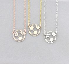 "Personalized tiny soccer necklace makes a perfect team or coach gift! Trendy style and dainty size. Add initial and/or number engraving for a personalized touch. 100% Sterling Silver or 14K Gold/Rose Gold Filled for Quality Keepsake Jewelry!   Model is shown wearing the Gold option with an 16\" chain. See Photos for Options. More Items: https://www.etsy.com/shop/ivybydesign Handmade in our shop and packaged with care in an IvyByDesign gift box (see last photo). SHIPS in 1 Business Day! RETURN P Soccer Gift Ideas, Soccer Necklace, Soccer Jewelry, Soccer Coach Gifts, Football Jewelry, Soccer Coach, Soccer Gifts, Coach Gift, Personalized Gifts For Mom