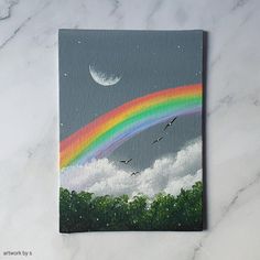 an acrylic painting of a rainbow in the sky with birds flying around it