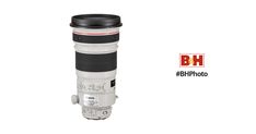 a large camera lens sitting on top of a white background with the words bh photography