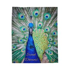 a peacock with its feathers spread out and the words sweet dreams on it's back