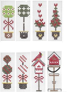 the cross stitch pattern shows different types of houses and trees