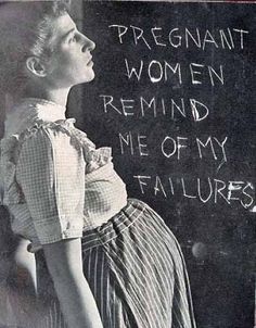 a woman standing in front of a blackboard with writing on it that says pregnant women remind me of my failure