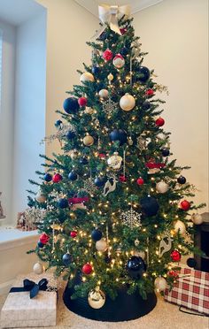 a decorated christmas tree in a living room