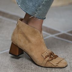 Step out in style with these Marcie Vintage Fringed Buckle Suede Ankle Boots! These handcrafted beauties feature a distinct fringed design with buckle accents, so you can make a statement wherever you go. Plus, with two lining options available - regular or short plush for winter, you'll be sure to find one that's just right for you! Time to show off your shoes-nal taste. Gender: WOMEN Item Type: Boots, Ankle Boots Upper Material: Kid Suede Lining: Genuine Leather, Short Plush Toe Shape: round t Mid Heel Ankle Boots, Nude Boots, Zipper Fashion, Office Shoes Women, Fringe Ankle Boots, Lady Shoes, Zippers Fashion, Fashion Office, Casual Chique