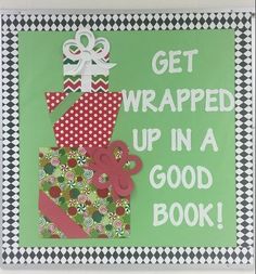 a green sign that says get wrapped up in a good book