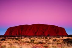 a red rock in the middle of nowhere