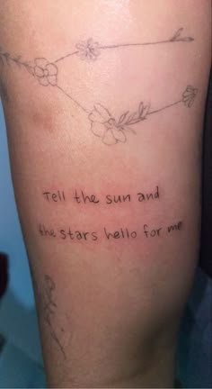 a tattoo saying tell the sun and the stars hello for me