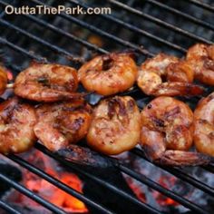 shrimp and sausage skewers cooking on the grill