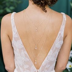 "Our Sadie wedding back necklace is a beautiful little bridal back chain, perfect for an open back or low back wedding dress. Pair this beautiful backdrop necklace with a modern wedding dress or pantsuit.  Available in silver, gold and rose gold, this beautiful body jewelry has an added sparkle with 3 beautiful geninue crystal teardrop pendants in 3 different sizes and accented with round glass pearls.  Around the front neck is a choker necklace with a single 4mm round glass pearl and at the bac Elegant Backless Backdrop Necklace For Wedding, Delicate Wedding Backdrop Necklace, Crystal Backdrop, Backdrop Necklace, V Necklace, Back Chain, Backdrops Necklace, Open Back Wedding Dress, Back Necklace