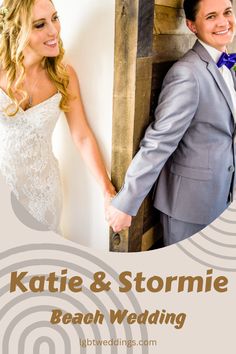 a man and woman are holding hands in front of a wooden frame with the words kate & stormie beach wedding