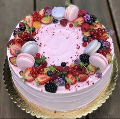 there is a cake that has fruit on it