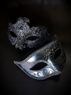 The men's Venetian mask features black glitter around the eyes, casting a spell of mystery and sophistication. For the ladies who embrace elegance with a touch of sparkle, our women's mask is adorned with gems. This luxurious mask set is ideal for masquerade balls, weddings, or any special occasion!


Age Group/Gender - Adult/Unisex

Size/Type - One size fits all adults

Mask Color - Black

Mask Material - Resin/Fabric

Accent Material - Glitter Black Full Face Masks For Costume, Black Full Face Masks For Costumes, Full Face Black Costume Mask, Black Formal Eye Mask Masquerade, Black Formal Eye Mask, Formal Black Eye Mask, Black Formal Masquerade Mask For Halloween, Black Full Face Masquerade Mask For Costume, Black Gothic Eye Mask For Masquerade