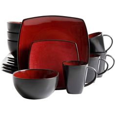 red and black dinnerware set with matching cups